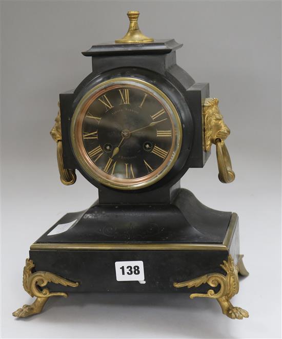 A French black marble eight day mantel clock